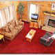 Great room with fireplace in cabin 101 (Heavenly Hideaway) at Eagles Ridge Resort at Pigeon Forge, Tennessee.