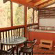 Deck with hot tub in cabin 101 (Heavenly Hideaway) at Eagles Ridge Resort at Pigeon Forge, Tennessee.