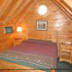 Bedroom View of Cabin 206 (Mountain Rendezvous) at Eagles Ridge Resort at Pigeon Forge, Tennessee.