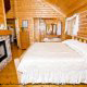 Bedroom View with Fire Place of Cabin 70 (Mountain Laurel Hideaway) at Eagles Ridge Resort at Pigeon Forge, Tennessee.