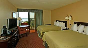 Deluxe suite with two queen beds and a private balcony at (Charleston Best Western) Charleston, South Carolina.