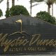 Resort Welcome Sign View at Mystic Dunes Resort & Golf Club in Orlando, Florida.